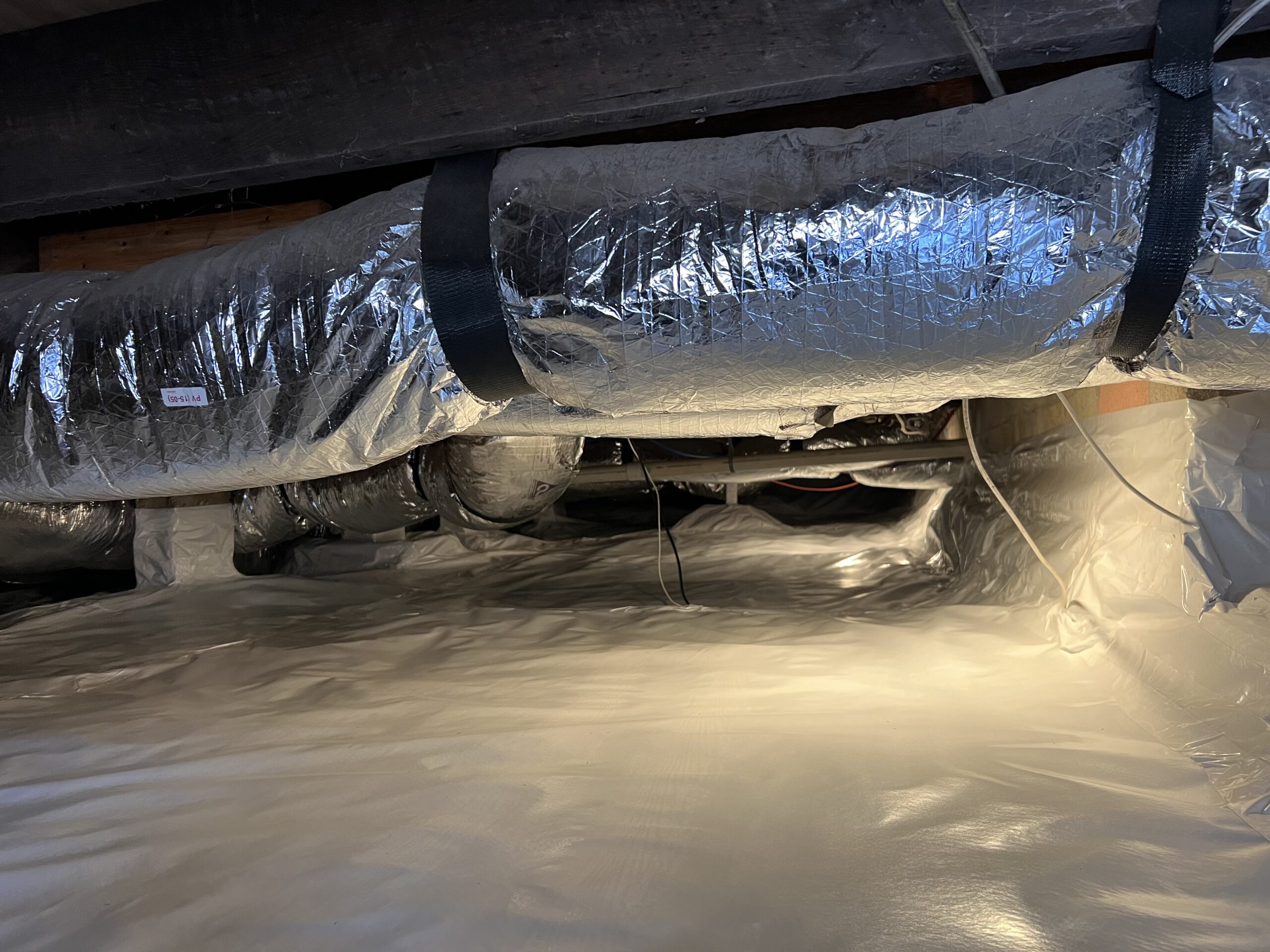 What is the purpose behind a Crawl-Space Vapor Barrier